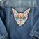 Mexican cat design on jacket embroidered