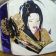 White cosmetic bag embroidered with geisha design