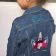 Embroidered denim jacket with royal unicorn design