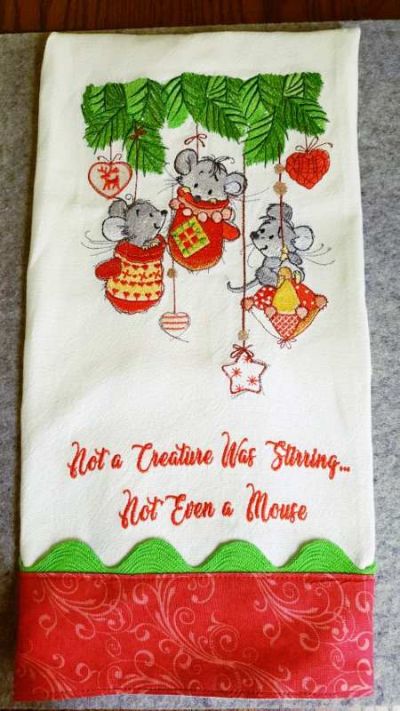 Embroidered towel with Christmas mice design