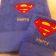 Superman logo embroidered on blue bath towel