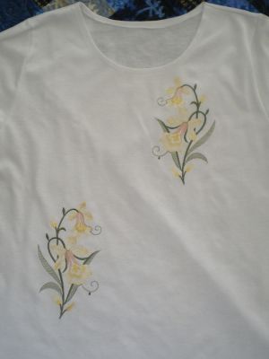 Shirt with flower embroidery design