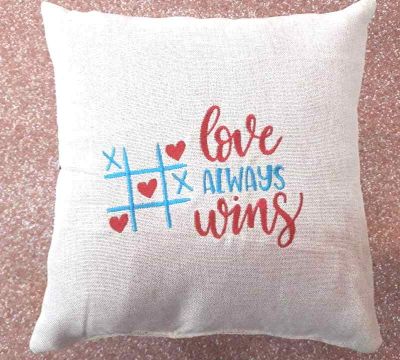Cushion with Tic Tac Toe loving game free embroidery design