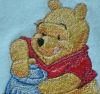 Shirt with Winnie Pooh machine embroidery design