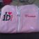 Pink hoodie with embroidered One direction logo on it