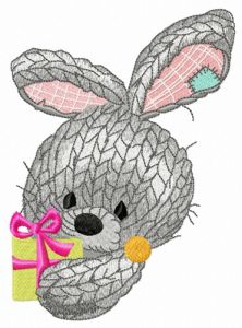 Knitted rabbit with present embroidery design