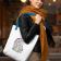 tote bag wit autumn free embroidery design of woman posing outside