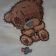 Tiny Teddy bear with children's dummy  design embroidered