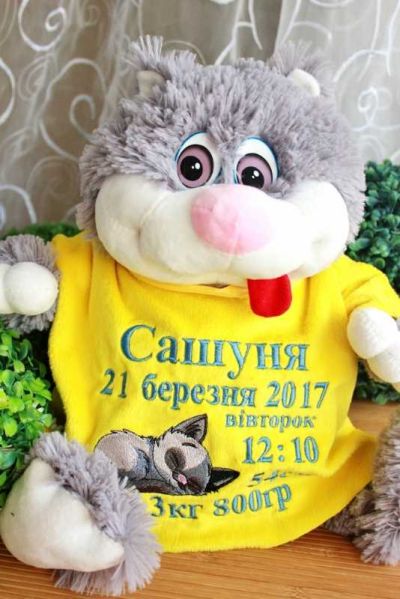 Plush bunny toy with embroidered shirt