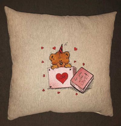Embroidered cushion with Tedy bear design