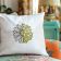 pillow with daisy embroidery design