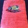 Pink girlish towel with train embroidered on it