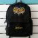 Embroidered backpack with batman vintage logo design