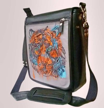Embroidered leather bag with tiger design