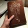 Embroidered leather diary cover with dreamcatcher design