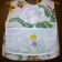 Embroidered apron with tiny girl