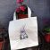 Embroidered shopping bag with gnome design