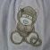 Baby wear embroidered with blue nose monkey design