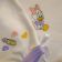 Little Daisy Duck design on babywear embroidered