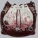 Leather handbag with flowers pattern