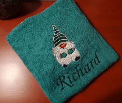 Embroidered bath towel with Gnome design