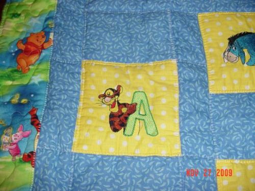 Tigger letter A design on quilt embroidered