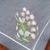 napkin with spring flower embroidery design
