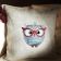 Owl in glasses on embroidered pillowcase