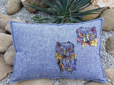 Embroidered cushion with owl