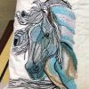 Cushion with horse embroidery design