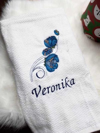 Embroidered towel with Peony and chamomile design