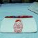 Cosmetic bag with nesting doll red embroidery design