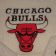 White bath towel with Chicago Bulls embroidered logo on it