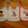 Baby bibs embroidered with Mickey Mouse and Daisy Duck designs