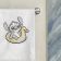 Bath towel with Stitch rides a rubber duck embroidery design