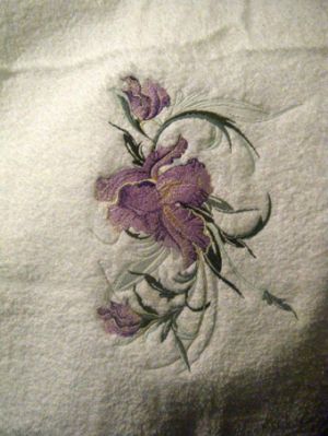 Towel with big iris embroidery design