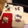 Embroidered Hello Kitty and Mickey Mouse designs on towels 