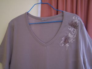 knit top with embroidery design 