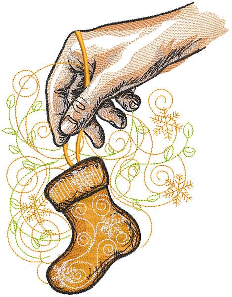 Hand holding a small Christmas Stocking Embroidery design