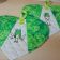 Frogs designs on potholder embroidered