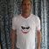 Joker's smile machine embroidery design on white t-shirt