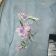 Big swirl iris design on shirt embroidered