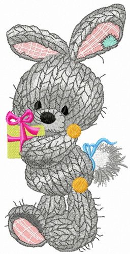 Knitted bunny with present machine embroidery design