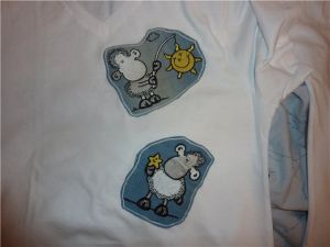 Sheepworld design embroidered on t-shirt