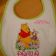 Embroidered Winnie Pooh and his friend Piglet on bib