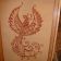 Firebird embroidered design in wooden frame
