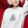 christmas themed- woman sweatshirt with showman embroidery design