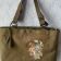 Embroidered bag with squirrel design