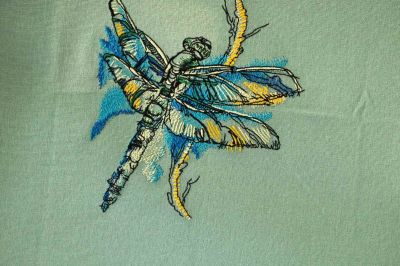 Dragonfly on bush branch embroidery design