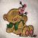 Teddy bear with pink flowers embroidery design
